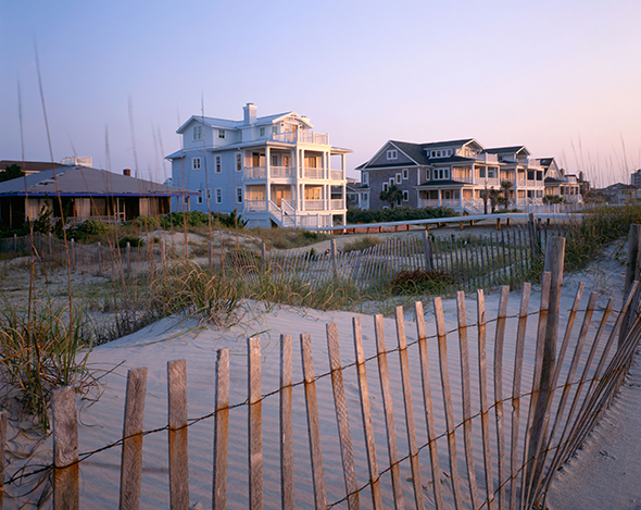 Beach houses at sunrise on the Atlantic Coast at Wrightsville Beach. (Photograph by Alamy via Beyond the Guidebook)